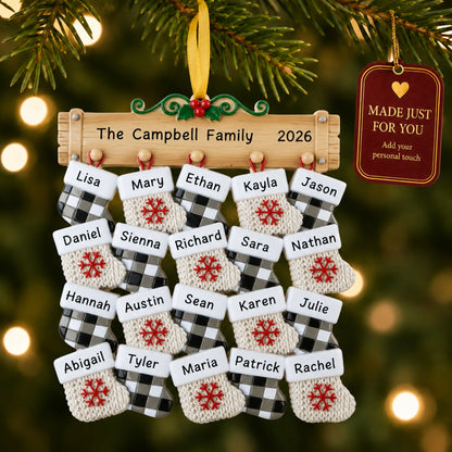 Large family of 20 christmas ornament hanging on a lit Christmas tree with a Made Just For You gift tag