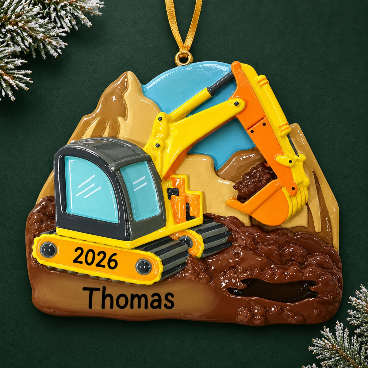 Personalized digger christmas ornament on a dark green pine background