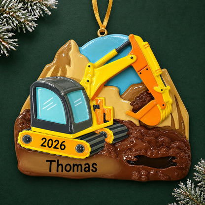 Personalized digger christmas ornament on a dark green pine background