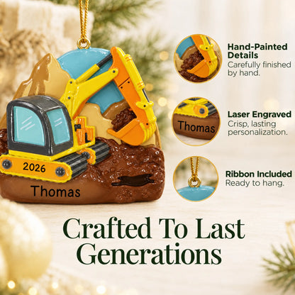 Hand-painted details and laser engraved personalization on the digger christmas ornament, ribbon included