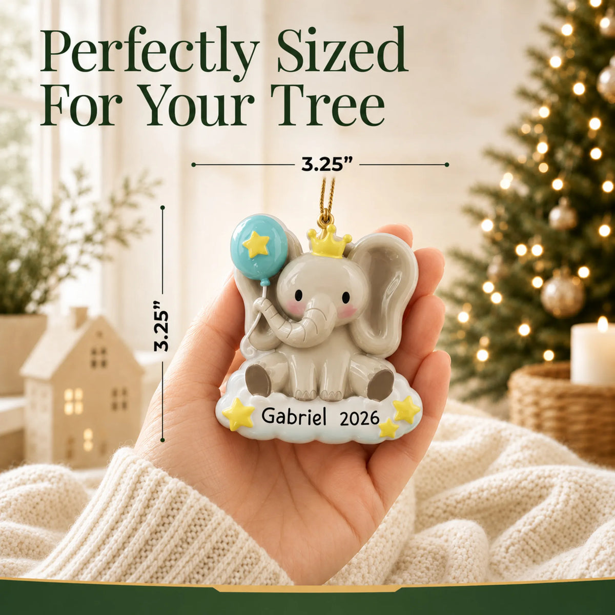 Size guide: the personalized baby boy elephant christmas ornament is 3.25 in wide by 3.25 in tall, shown in hand