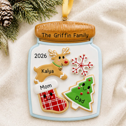 Personalized cookie jar family of 3 christmas ornament laid on a soft white knit blanket