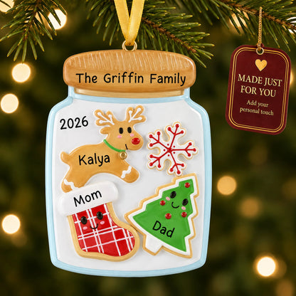 Cookie jar family of 3 christmas ornament hanging on a lit Christmas tree with a Made Just For You gift tag