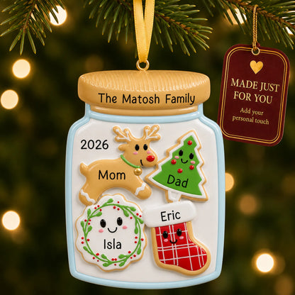 Cookie jar family of 4 christmas ornament hanging on a lit Christmas tree with a Made Just For You gift tag
