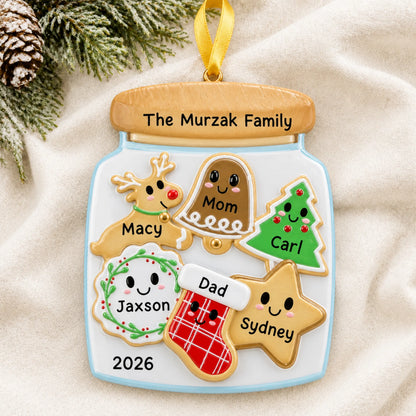 Personalized cookie jar family of 6 christmas ornament laid on a soft white knit blanket
