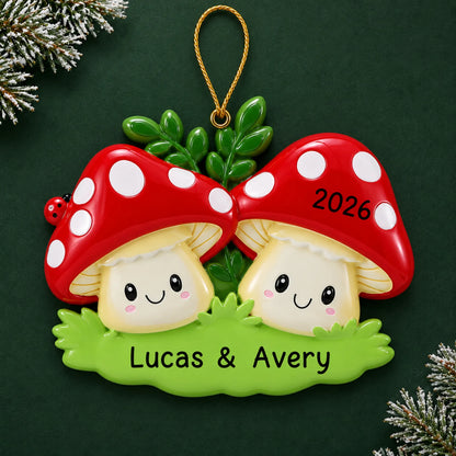 Personalized mushroom couple christmas ornament on a dark green pine background