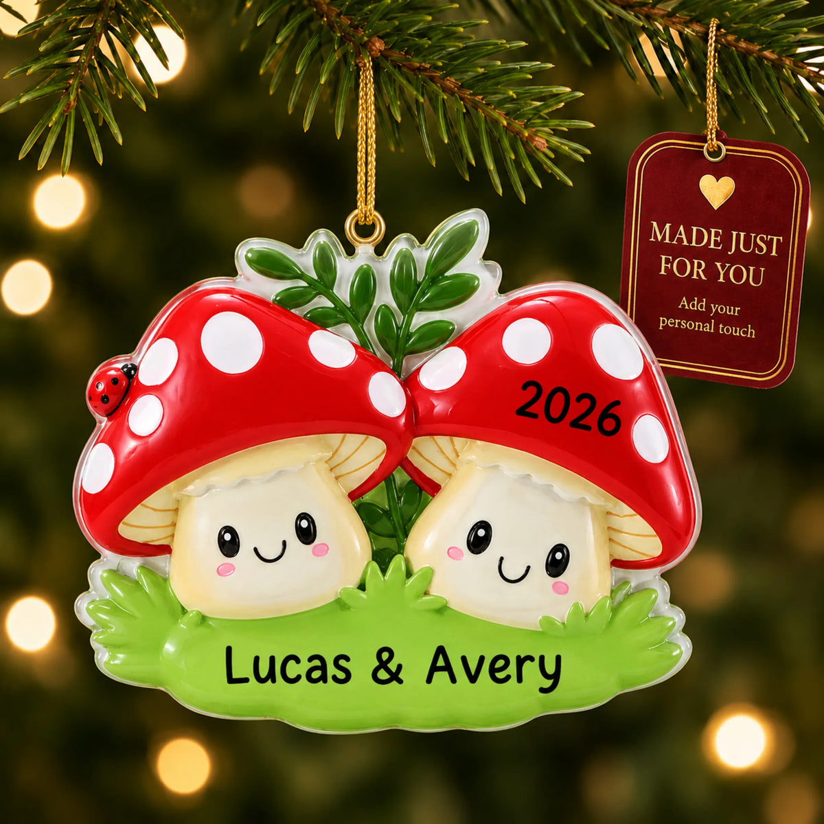 Mushroom couple christmas ornament hanging on a lit Christmas tree with a Made Just For You gift tag
