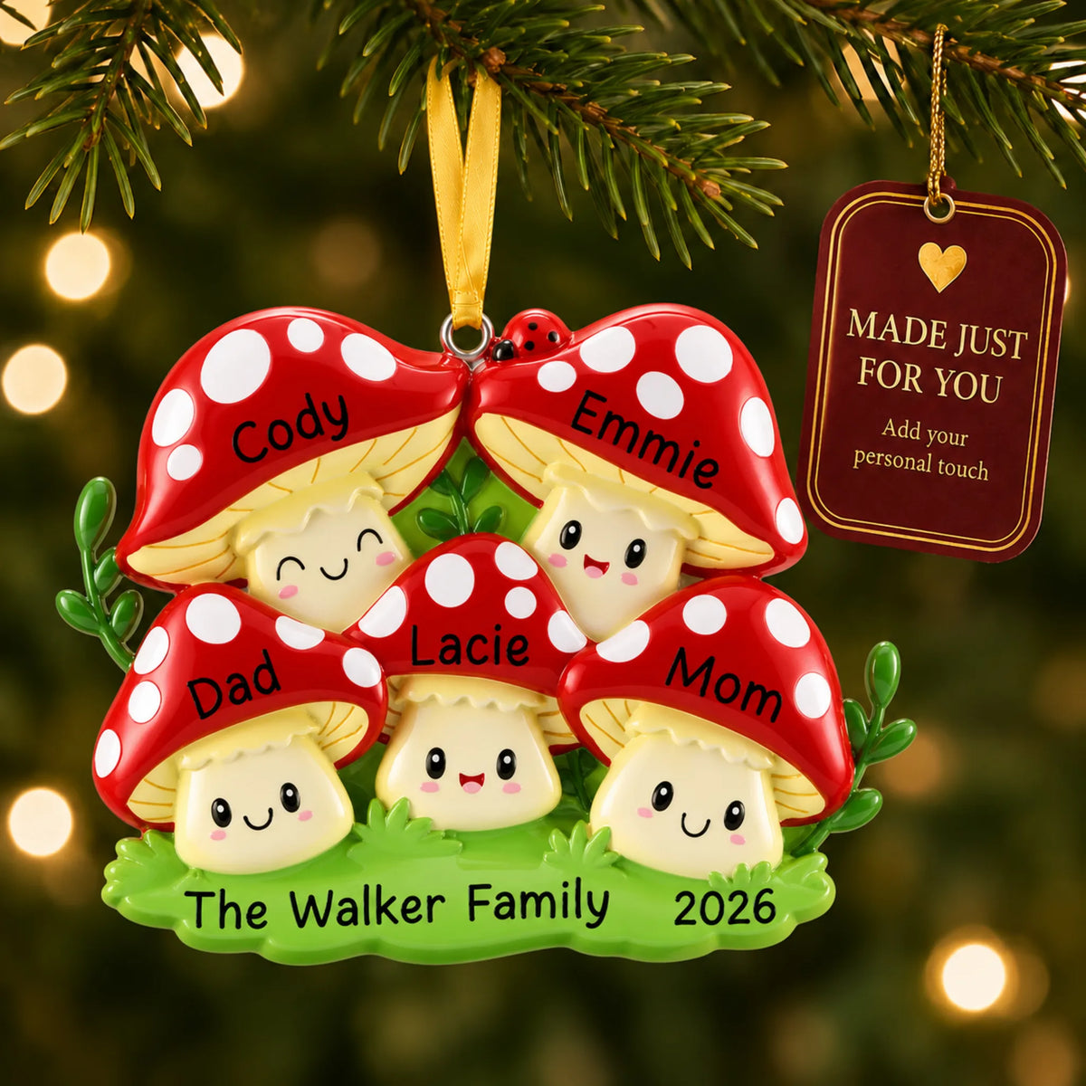 Mushroom family of 5 christmas ornament hanging on a lit Christmas tree with a Made Just For You gift tag