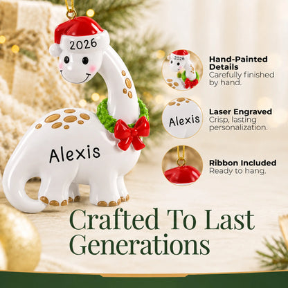 Hand-painted details and laser engraved personalization on the white dinosaur christmas ornament, ribbon included