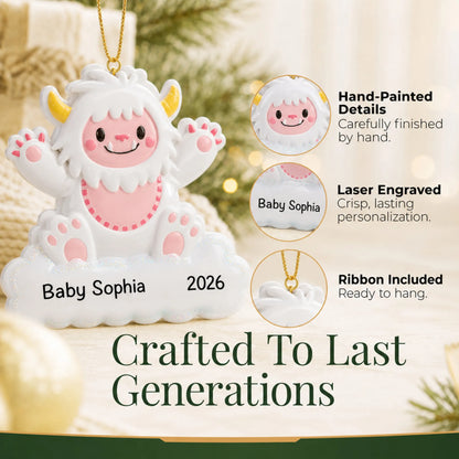 Hand-painted details and laser engraved personalization on the pink baby girl yeti christmas ornament, ribbon included