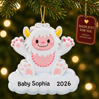Pink baby girl yeti christmas ornament hanging on a lit Christmas tree with a Made Just For You gift tag