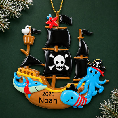 Personalized pirate ship christmas ornament on a dark green pine background