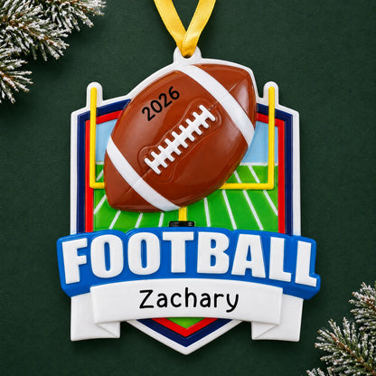 Personalized football collage christmas ornament on a dark green pine background