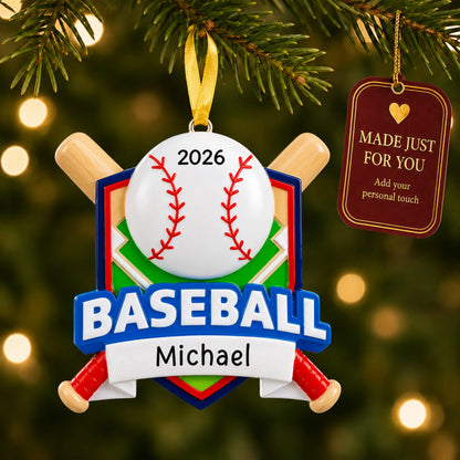 Baseball crossed bats christmas ornament hanging on a lit Christmas tree with a Made Just For You gift tag
