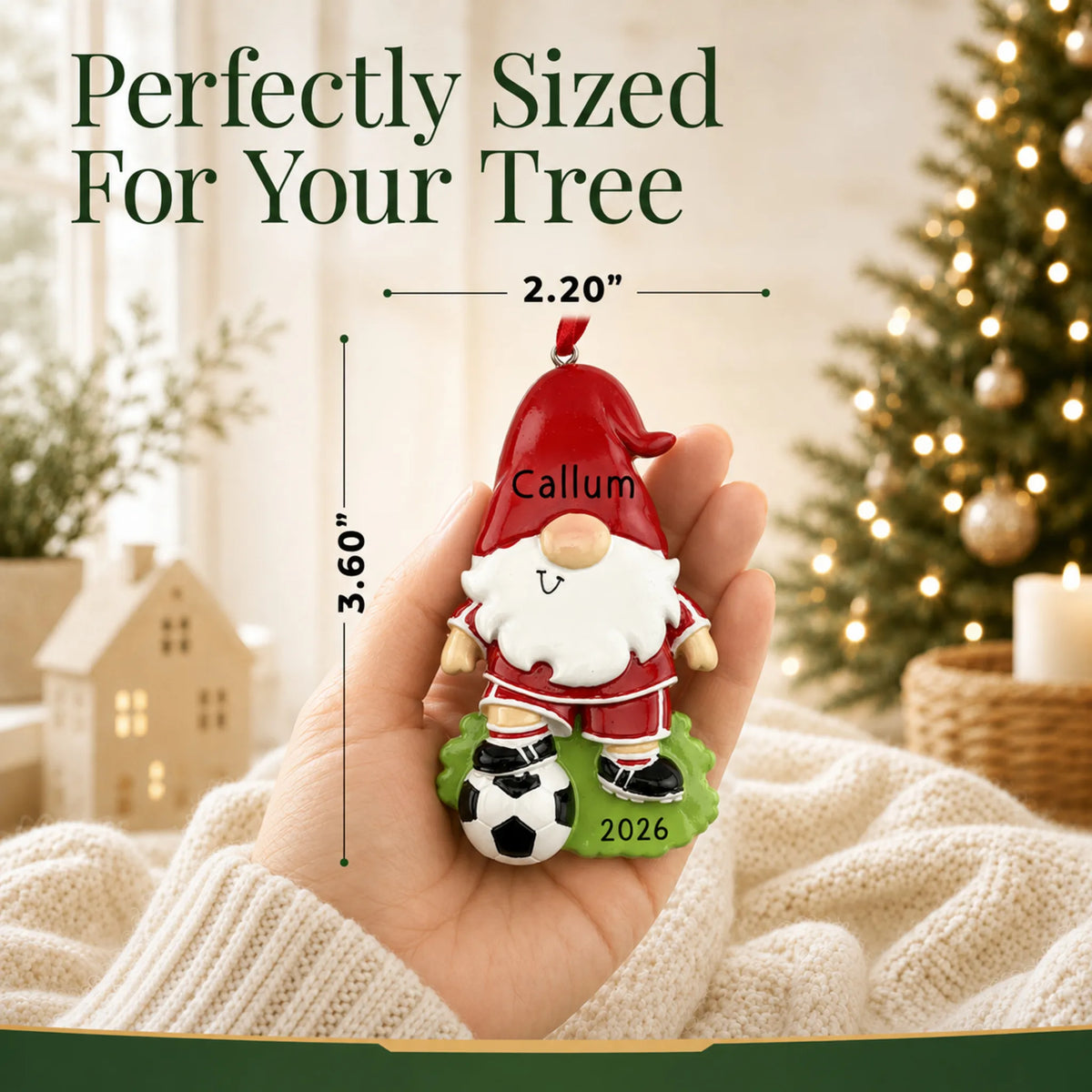 Size guide: the personalized soccer gnome christmas ornament is 2.20 in wide by 3.60 in tall, shown in hand