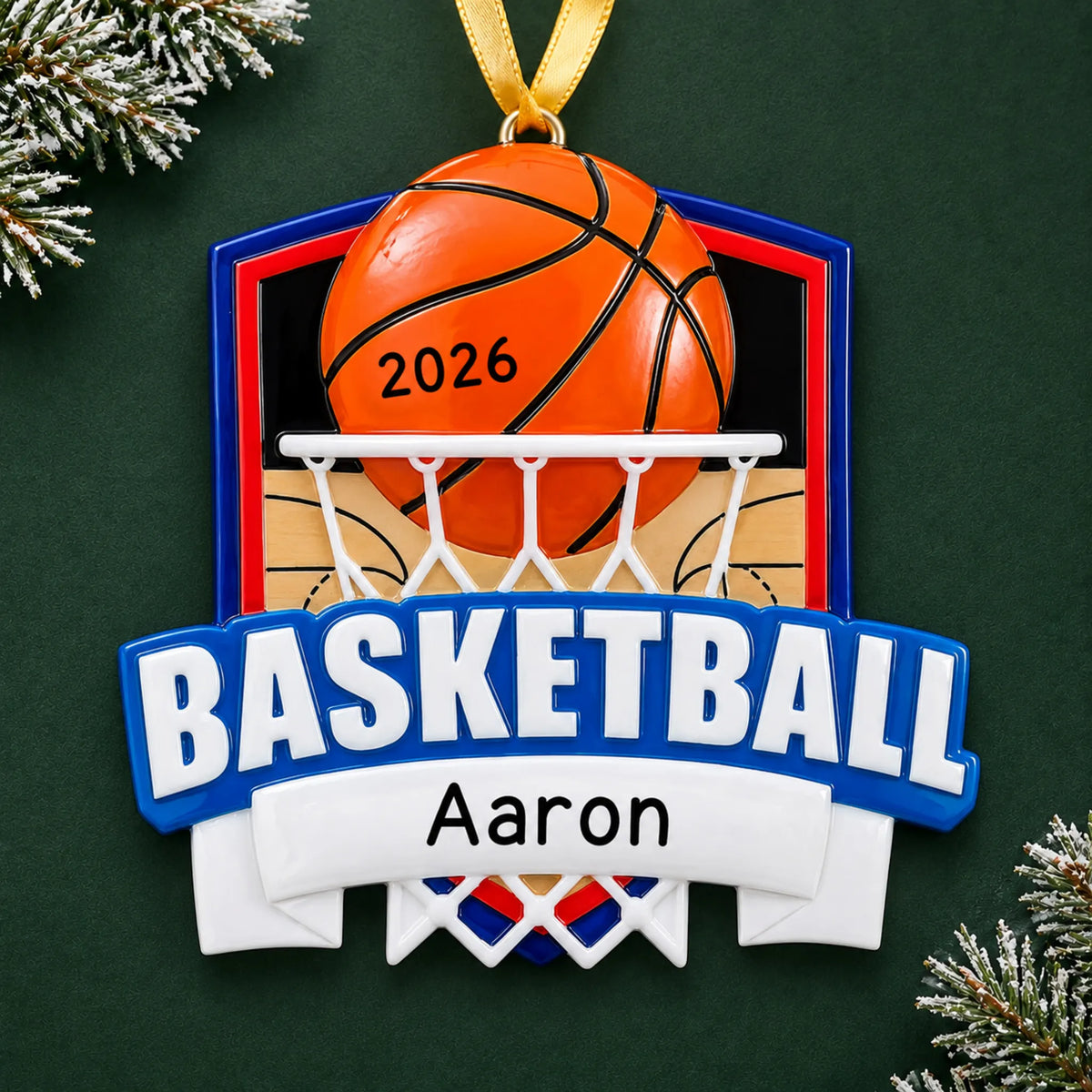 Personalized basketball shield christmas ornament on a dark green pine background