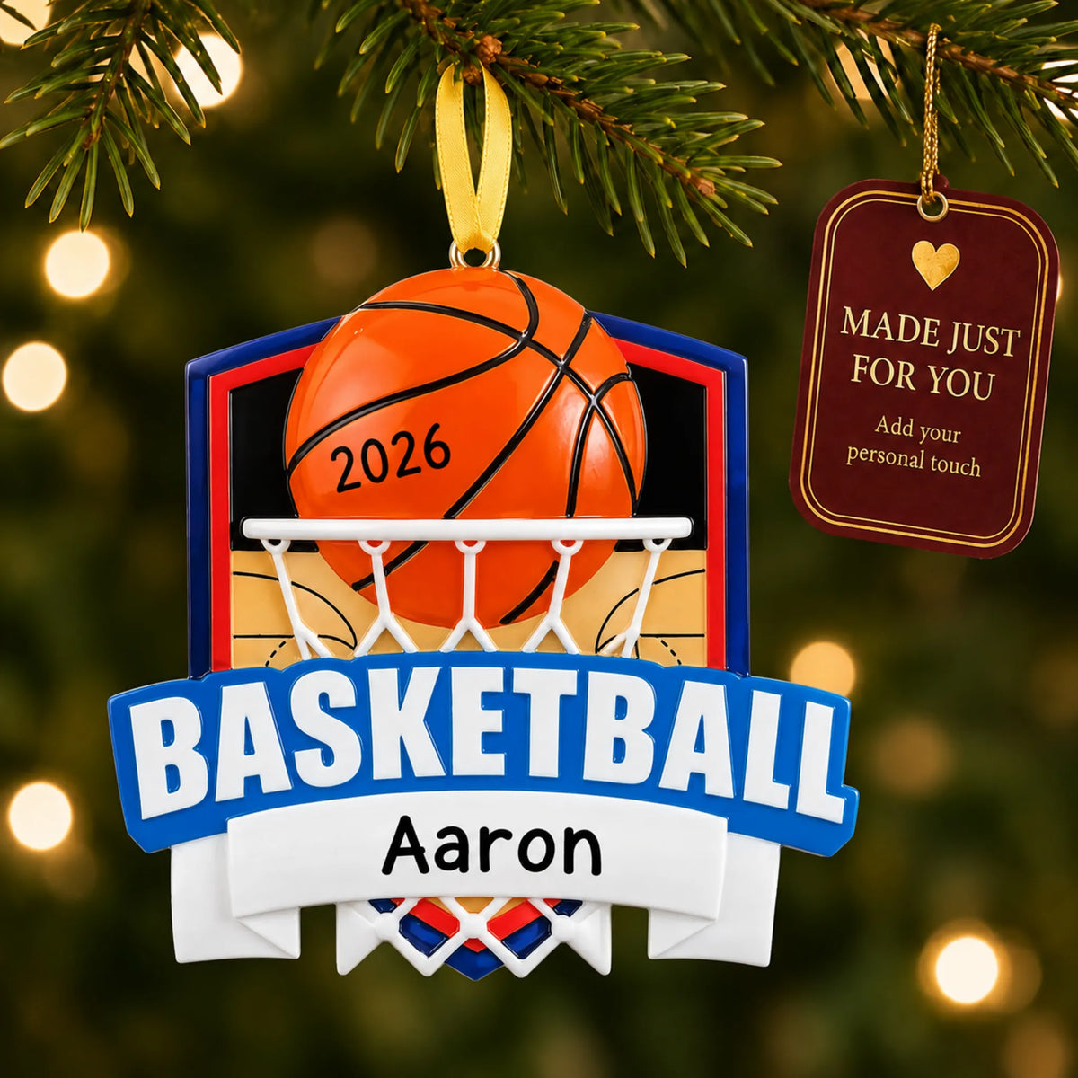 Basketball shield christmas ornament hanging on a lit Christmas tree with a Made Just For You gift tag