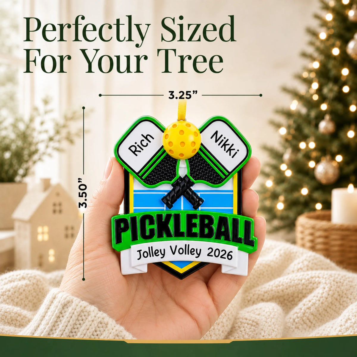 Size guide: the personalized pickleball christmas ornament shown in hand next to a Christmas tree