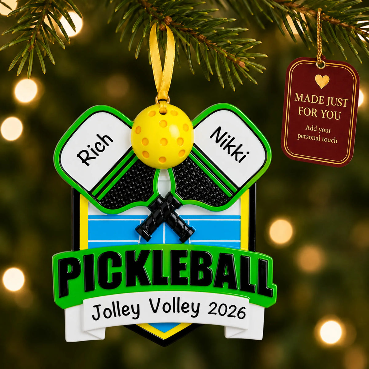 Pickleball christmas ornament hanging on a lit Christmas tree with a Made Just For You gift tag