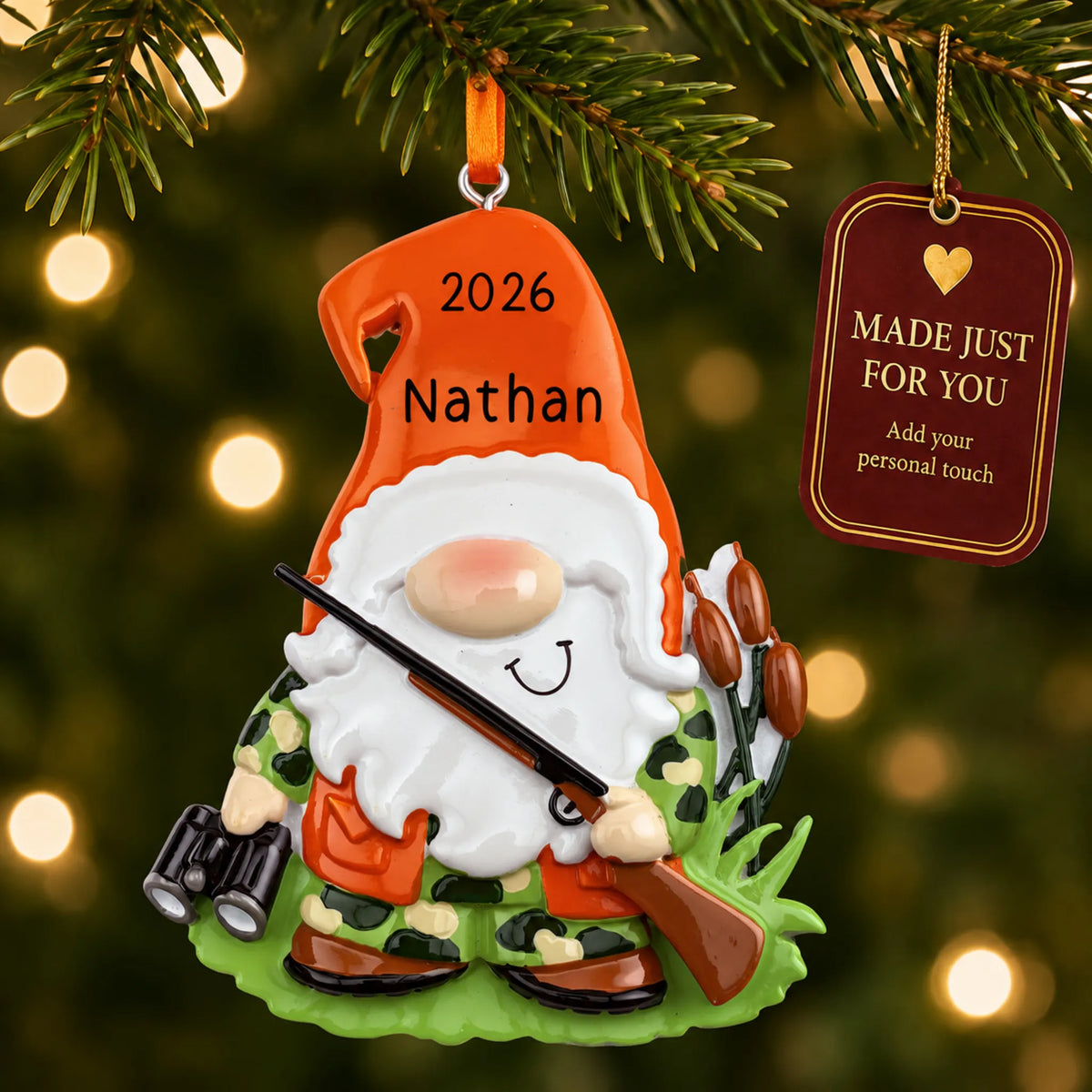 Hunting gnome christmas ornament hanging on a lit Christmas tree with a Made Just For You gift tag