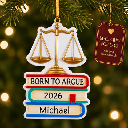 Born to Argue lawyer christmas ornament hanging on a lit Christmas tree with a Made Just For You gift tag