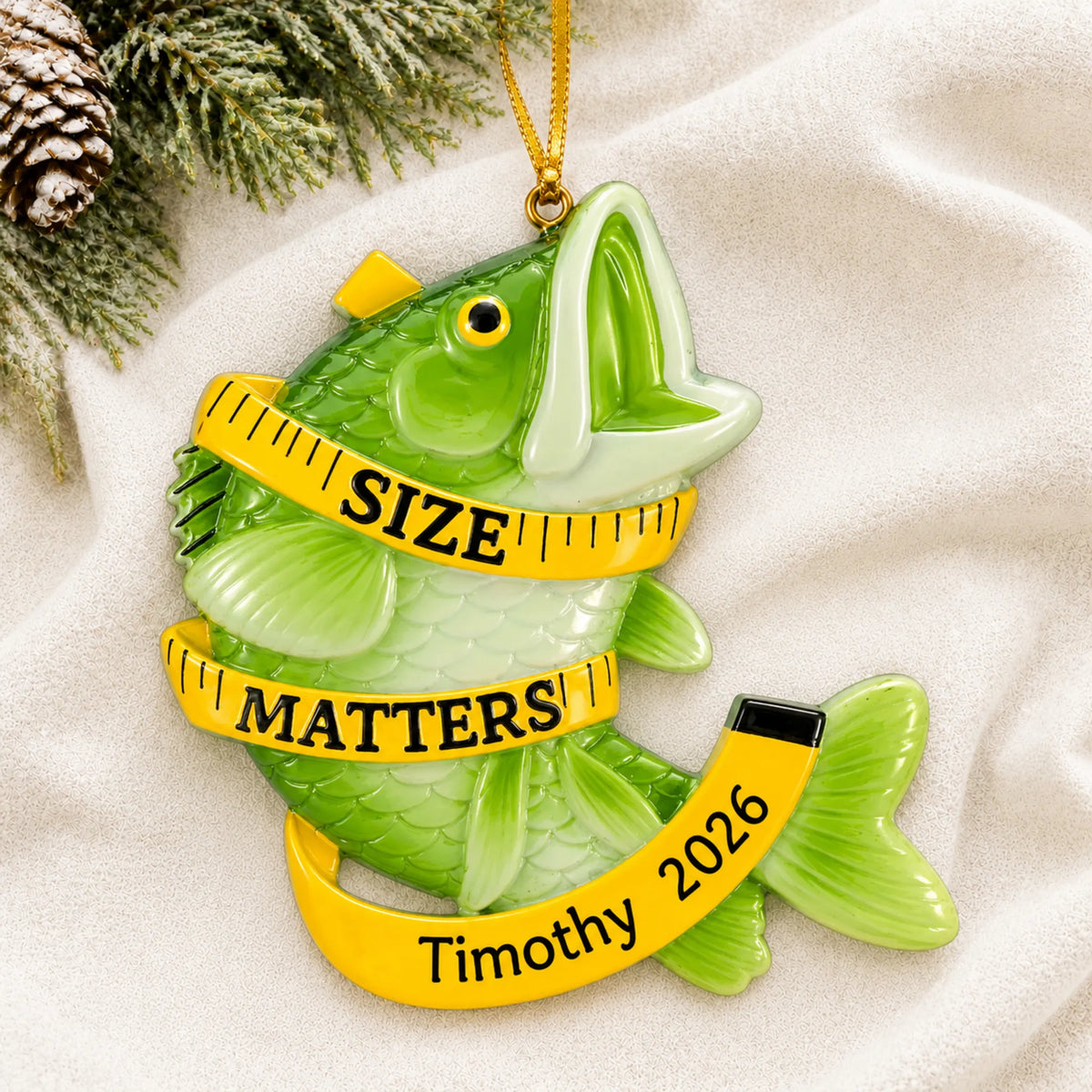 Personalized bass fishing size matters christmas ornament laid on a soft white knit blanket