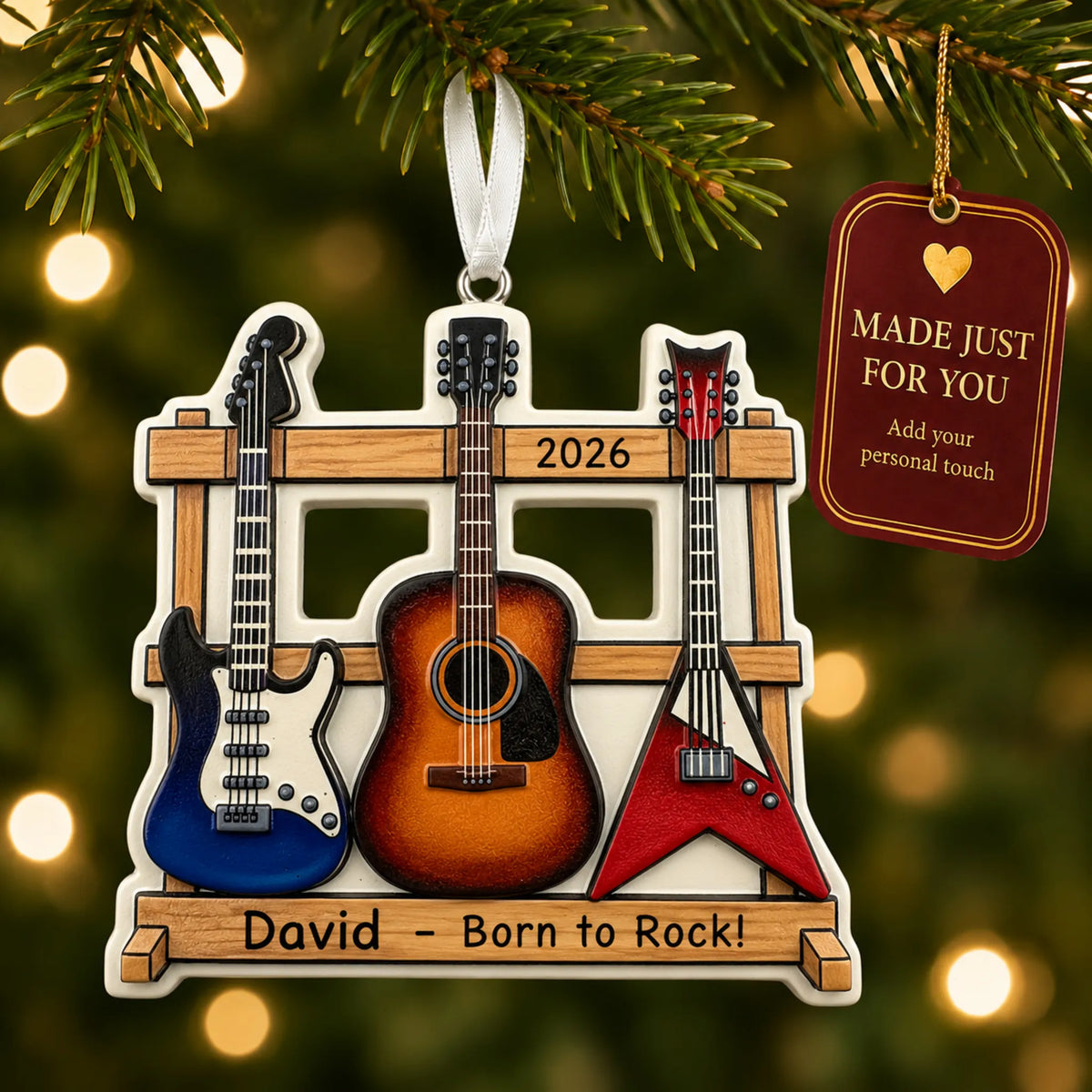 Guitar trio christmas ornament hanging on a lit Christmas tree with a Made Just For You gift tag