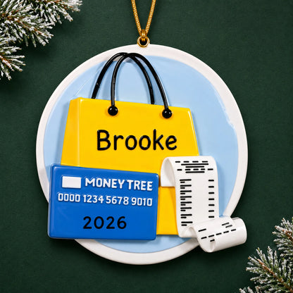 Personalized shopaholic christmas ornament on a dark green pine background