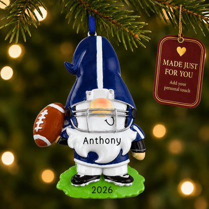 Gnome football player christmas ornament hanging on a lit Christmas tree with a Made Just For You gift tag