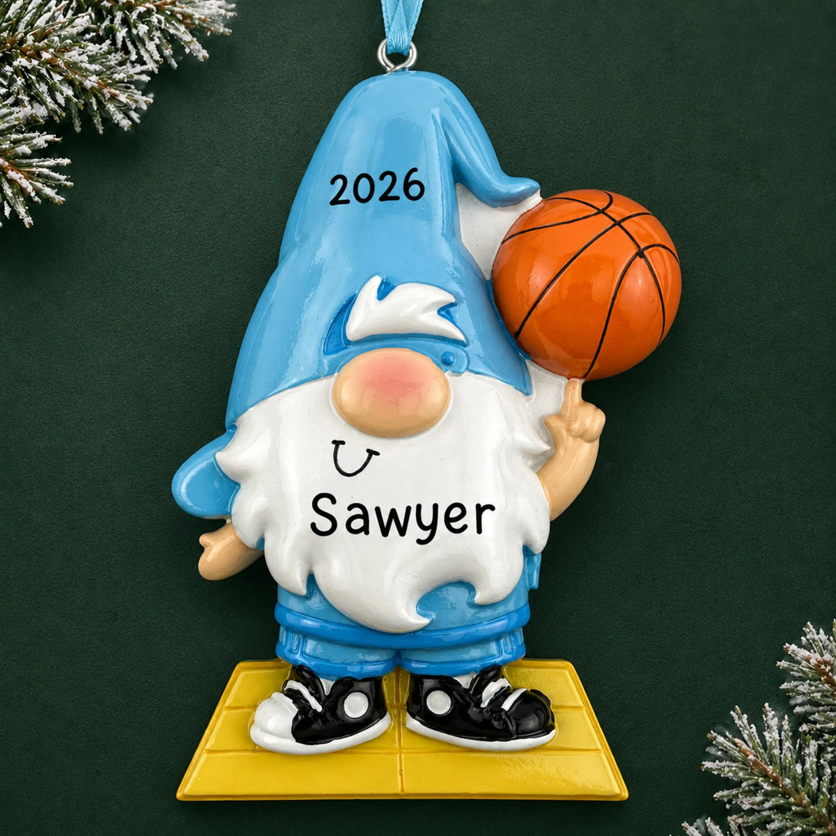 Personalized basketball gnome christmas ornament on a dark green pine background