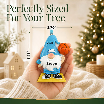 Size guide: the personalized basketball gnome christmas ornament is 2.70 in wide by 3.75 in tall, shown in hand