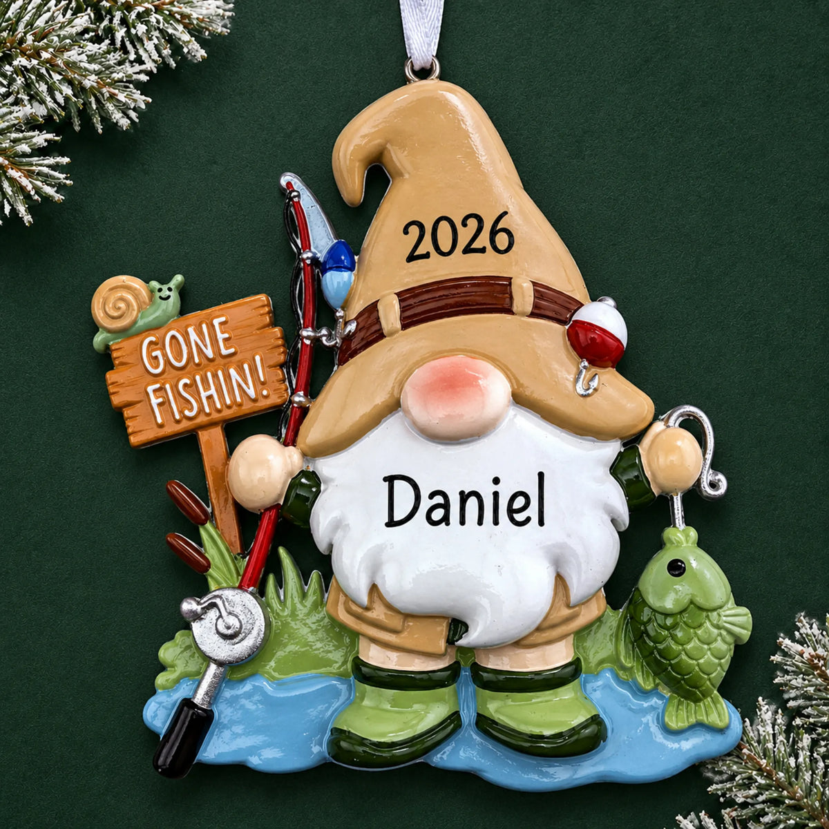 Personalized gnome fisherman christmas ornament on a dark green pine background