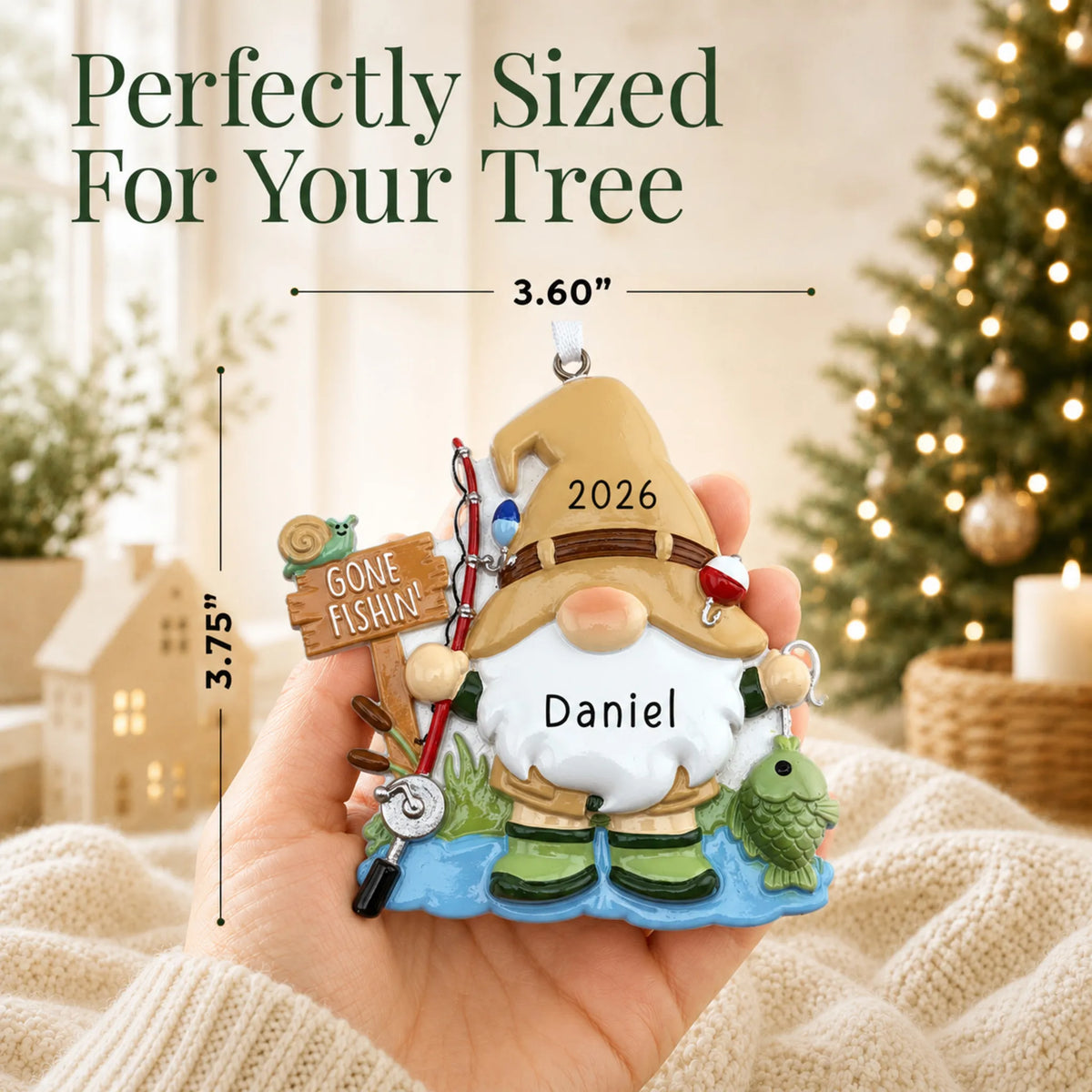 Size guide: the personalized gnome fisherman christmas ornament is 3.60 in wide by 3.75 in tall, shown in hand