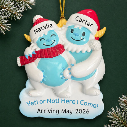 Personalized Expecting Yeti Couple christmas ornament on a dark green pine background