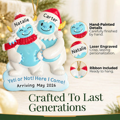 Hand-painted details and laser engraved personalization on the Expecting Yeti Couple christmas ornament, ribbon included