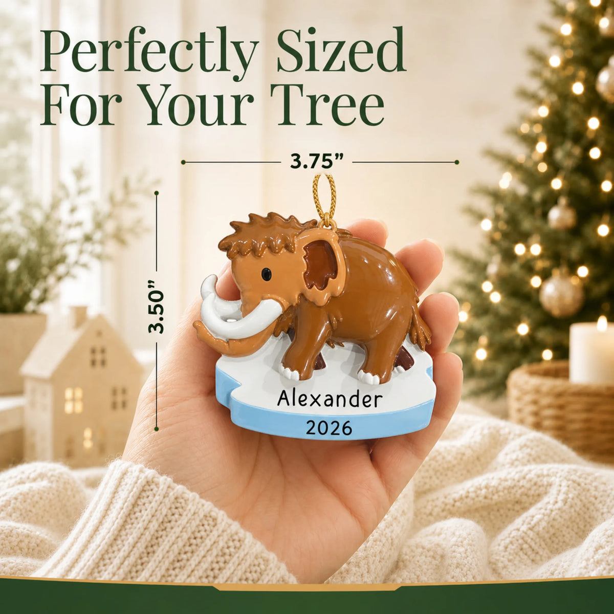 Size guide: the personalized woolly mammoth christmas ornament is 3.75 in wide by 3.50 in tall, shown in hand