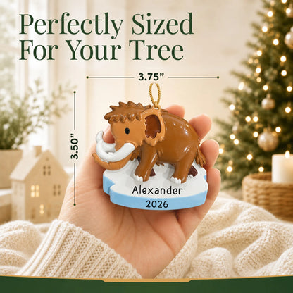 Size guide: the personalized woolly mammoth christmas ornament is 3.75 in wide by 3.50 in tall, shown in hand