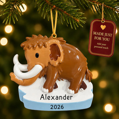 Woolly mammoth christmas ornament hanging on a lit Christmas tree with a Made Just For You gift tag
