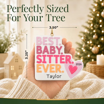 Size guide: the personalized best babysitter christmas ornament is 3.50 in wide by 3.25 in tall, shown in hand