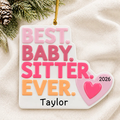 Personalized best babysitter christmas ornament laid on a soft white knit blanket