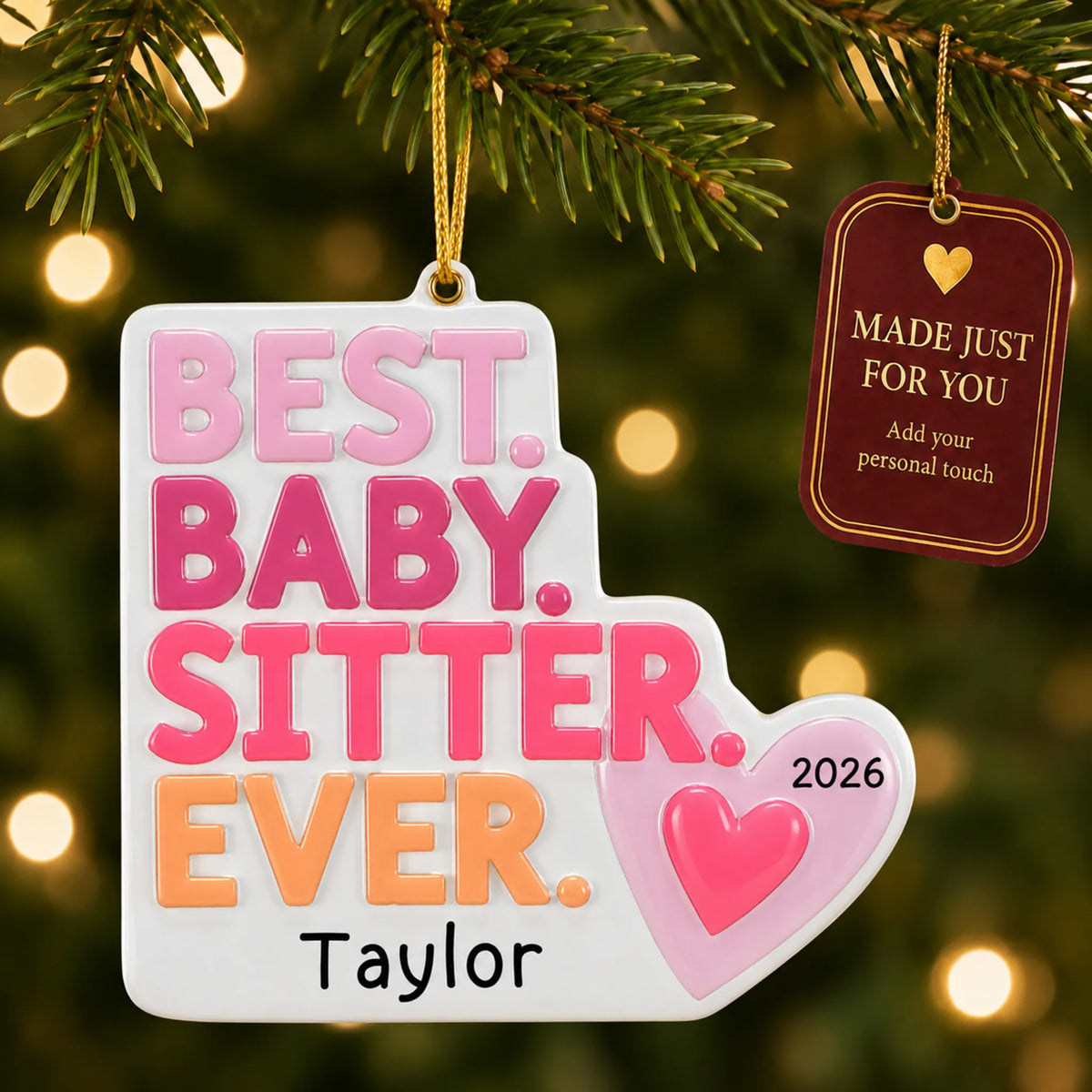 Best babysitter christmas ornament hanging on a lit Christmas tree with a Made Just For You gift tag