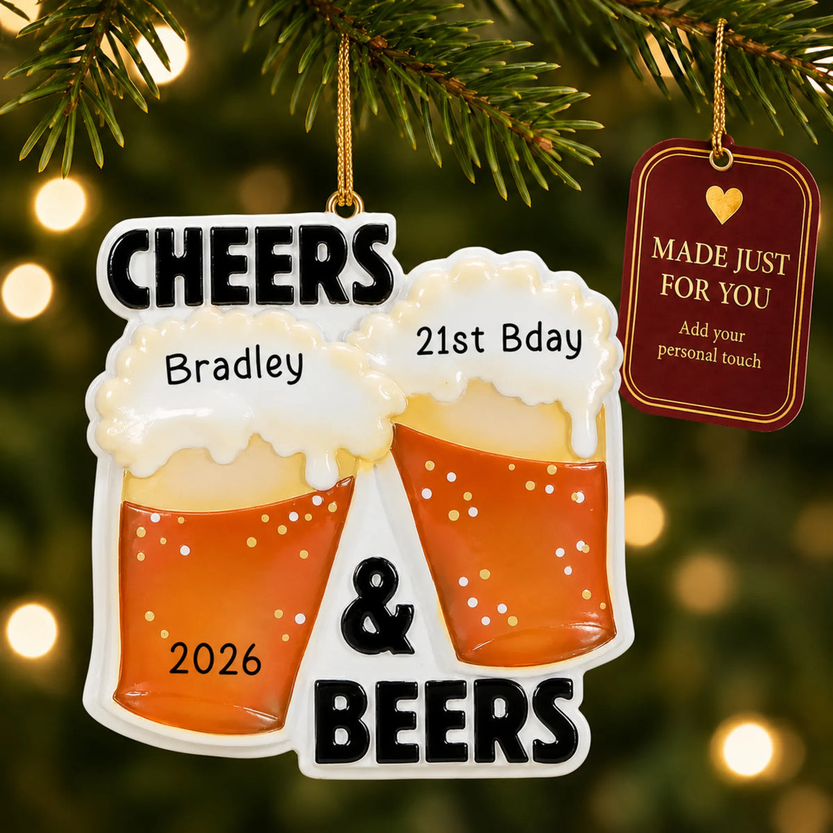 Cheers & Beers christmas ornament hanging on a lit Christmas tree with a Made Just For You gift tag