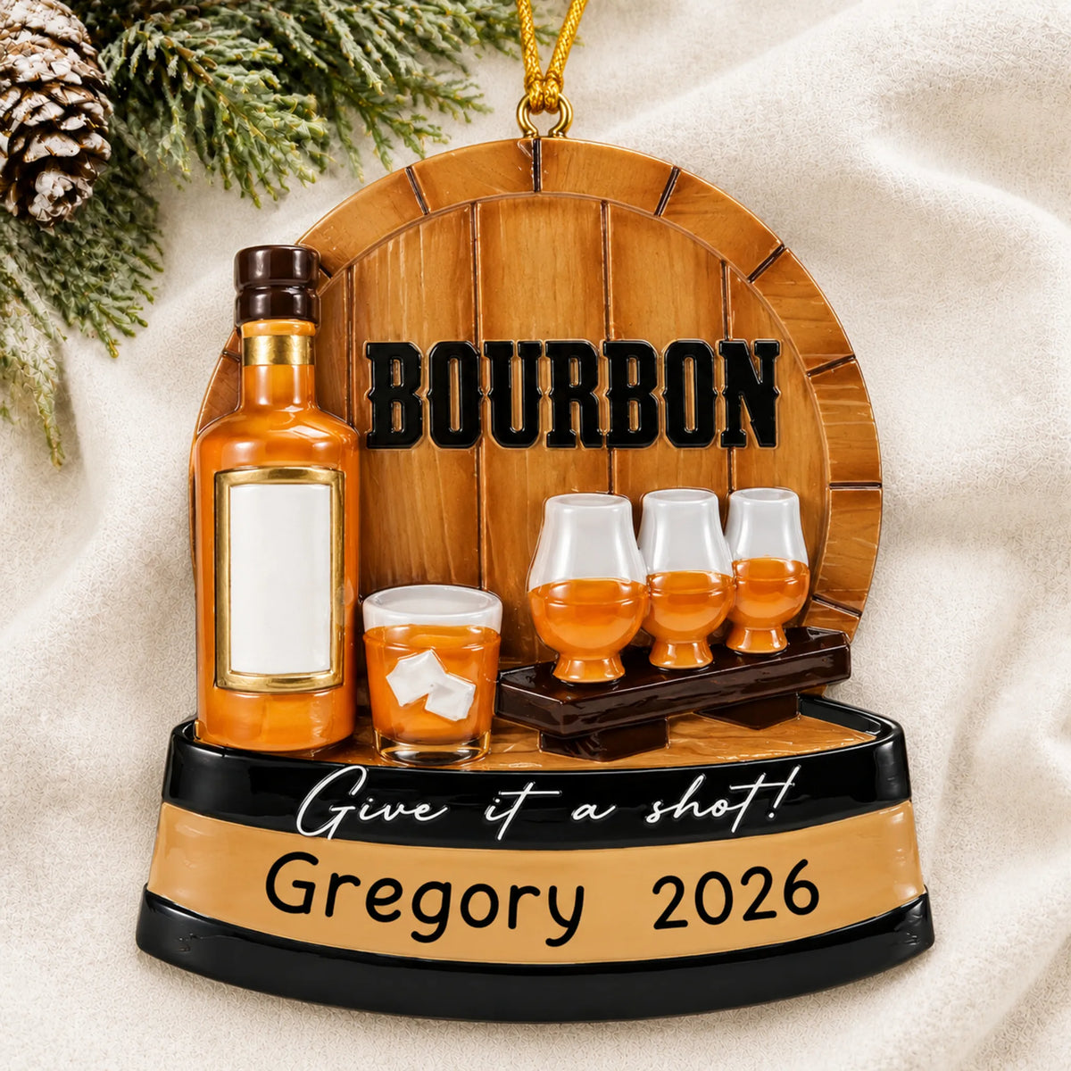 Personalized Bourbon Tasting christmas ornament laid on a soft white knit blanket