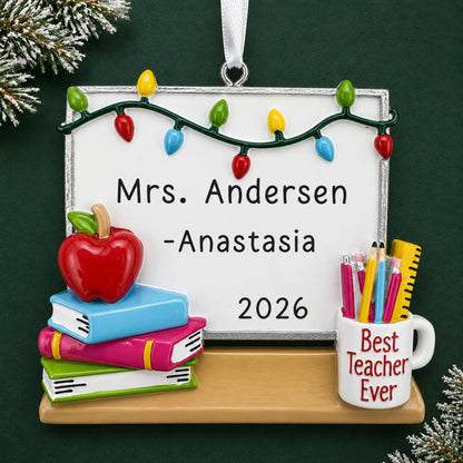 Personalized teacher whiteboard Christmas ornament with name and year, shown on a green holiday background