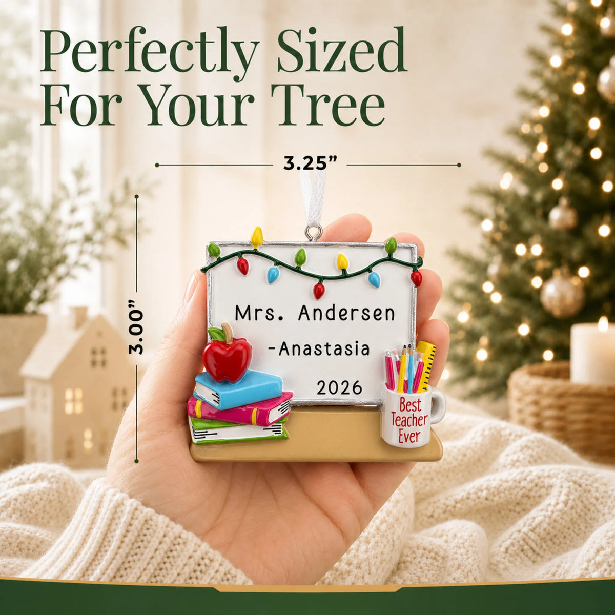 Personalized teacher whiteboard Christmas ornament held in hand to show its size on the tree