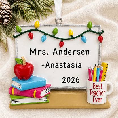 Personalized teacher whiteboard Christmas ornament shown on a soft white blanket