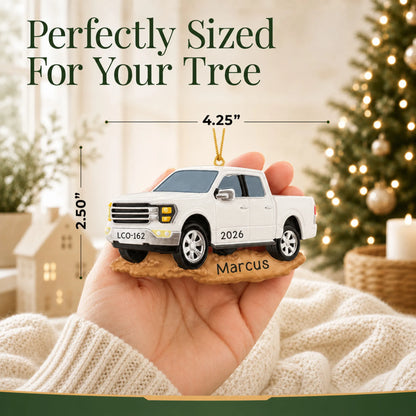 Size guide: the personalized White Pickup Truck christmas ornament is 4.25 in wide by 2.50 in tall, shown in hand