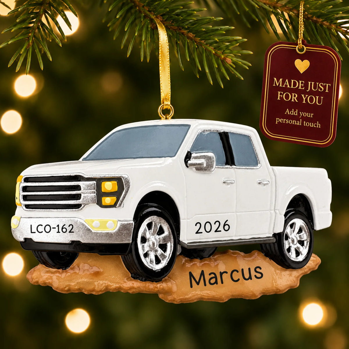 White Pickup Truck christmas ornament hanging on a lit Christmas tree with a Made Just For You gift tag