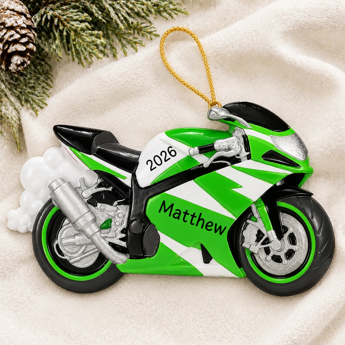 Personalized Crotch Rocket Motorcycle christmas ornament laid on a soft white knit blanket