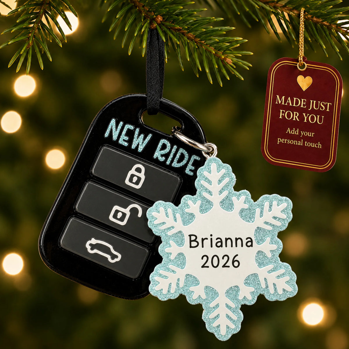 New car key fob christmas ornament hanging on a lit Christmas tree with a Made Just For You gift tag